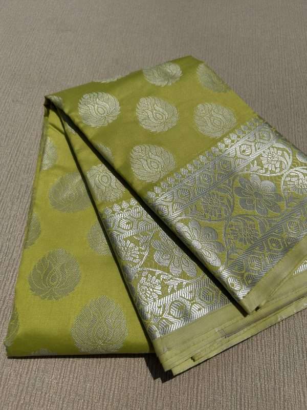 Lush Green Silk Saree with Silver Elegance