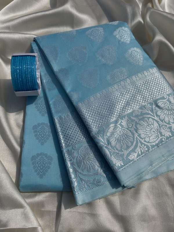 Luxurious Blue Silk Saree with Silver Embellishments